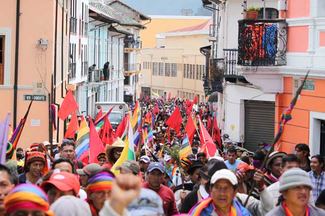 Protesters march through old town Quito