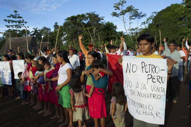 Achuar protesting Peru's state oil company's plans to operate on their land.