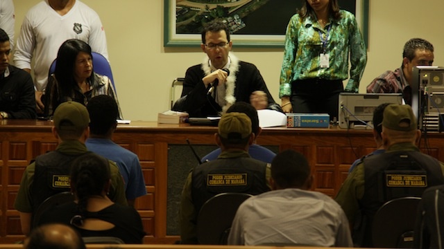 Judge Murilo Lemos reading the sentences at the conclusion of the trial of the men who killed Zé Claudio and Maria do Espirito Santo. Photos by Marcelo Lacerda