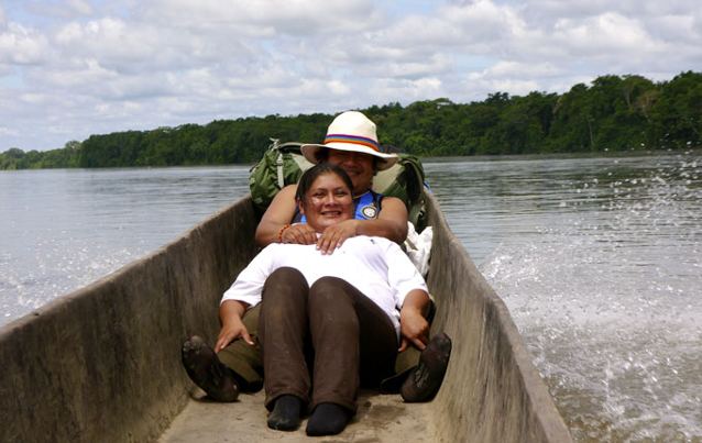 VJaime Vargas and his wife Imelda in a dugout canoe on the Rio Pastaza