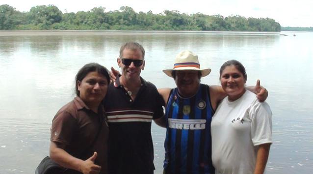 Nicholas Isherwood with Jaime Vargas, Vargas' wife Imelda, and his brother Marlon on the Rio Pastaza