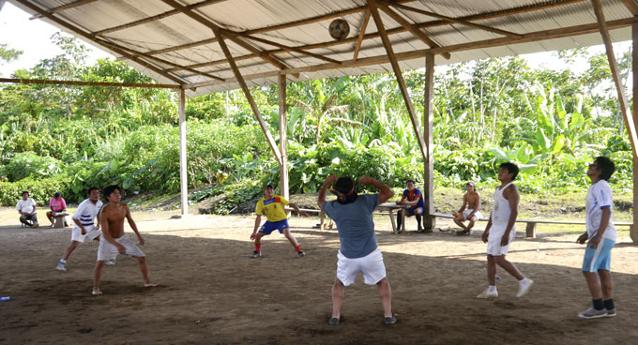 Achuar villagers playing volleyball, a favorite sport