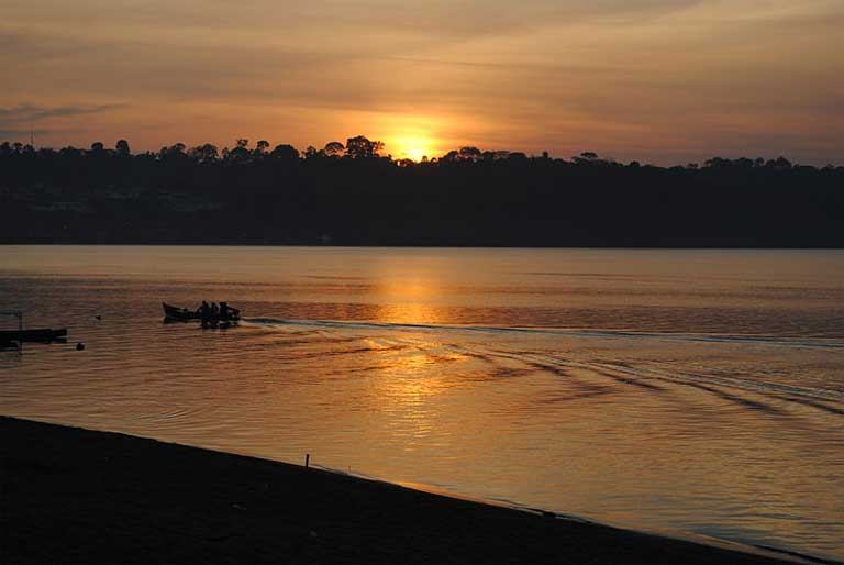 Sunset over the Xingu River. The Belo Monte dam on the Xingu, the proposed Sāo Luiz do Tapajós dam, and six more large dams proposed for the Tapajós basin will do more than staunch the flow of once wild rivers, they also bring urbanization and urban problems such as street crime and poverty to once remote areas. Photo credit: Analita Freitas Duarte licensed under the Creative Commons Attribution-Share Alike 4.0 International license.