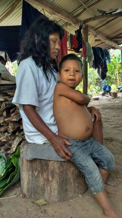 "U'wa locals say the drinking water didn't used to make them sick and that the parasitic worm which has recently contaminated the water supply severely affects indigenous children, swelling their stomachs and leaving them malnourished."
